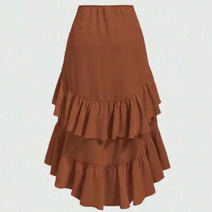 Asymmetrisk långkjol med volanger och drapering