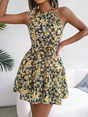 Blommig klänning halterneck