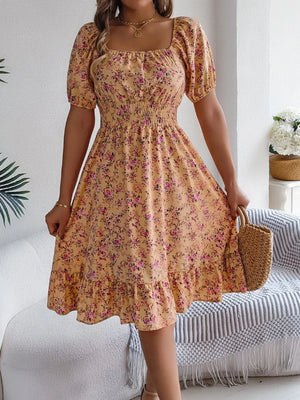 Blommig off-shoulder midiklänning Gul / S