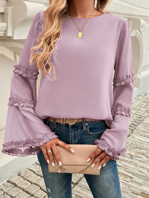 Blus med trumpetärm
