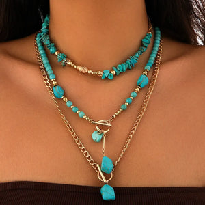 Boho halsband med western-berlocker Guld och turkos