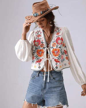 Broderad blus med blommor
