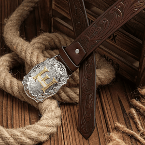 Cowboybälte med gyllene bokstav