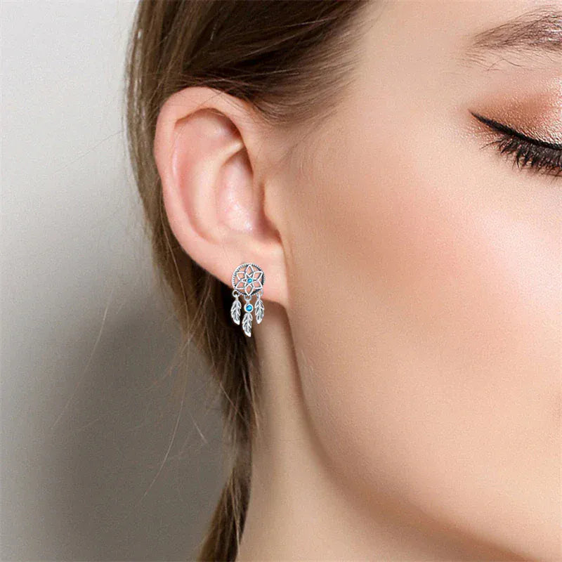 Orecchini acchiappasogni in argento con zircone