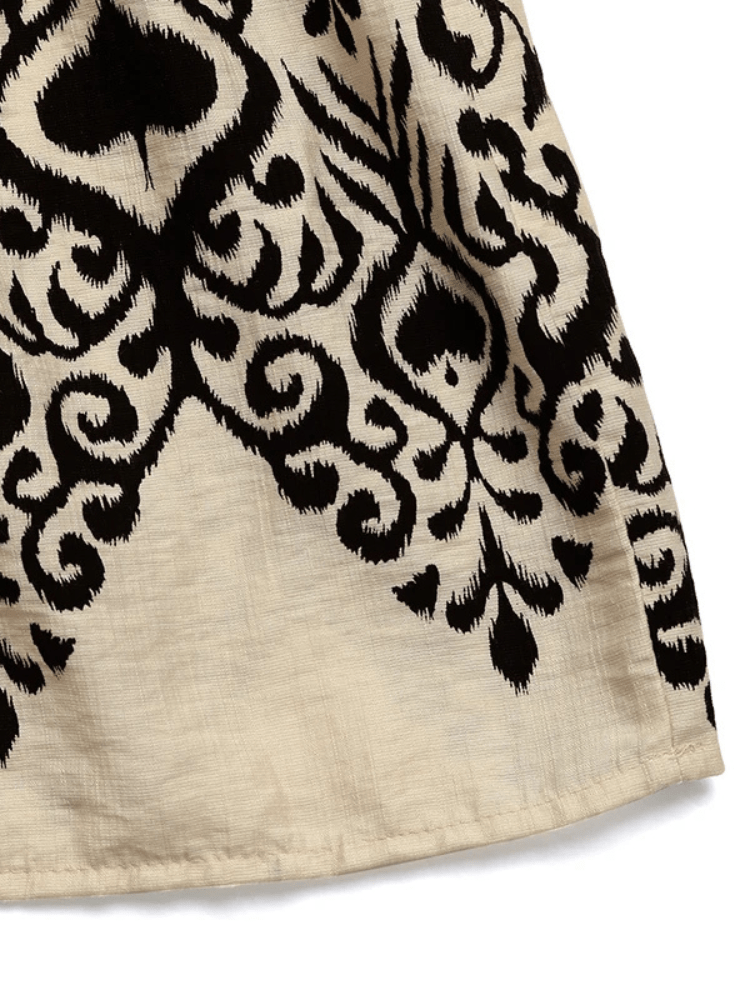 Beige bohemisk maxiklänning med svart mönster