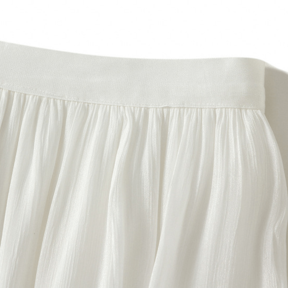 Midikjol med asymmetrisk drapering