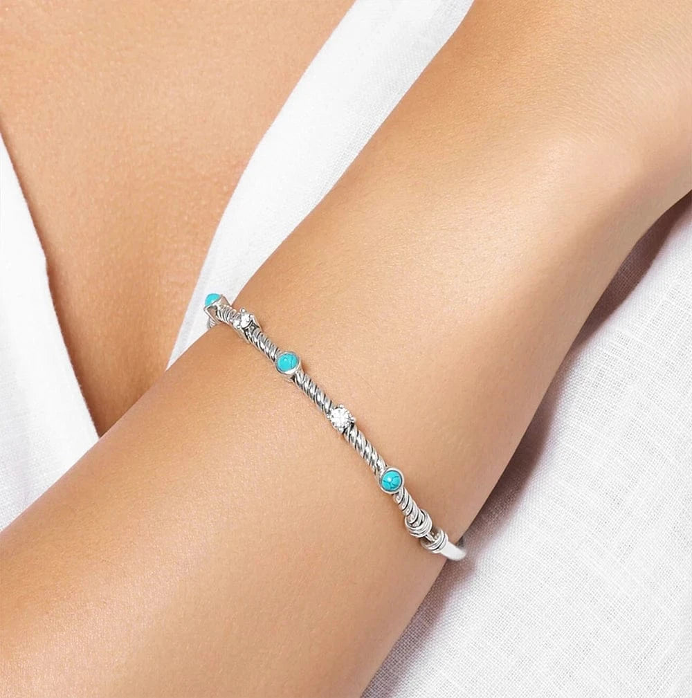 Stelt Silverarmband med Vriden Design och Turkosa Stenar Silver med turkos