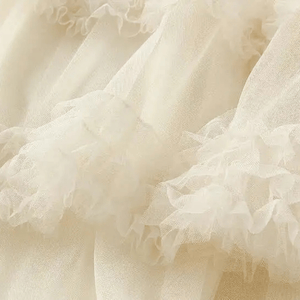 Tyllkjol med strukturerad spets