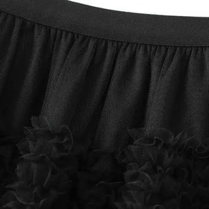 Tyllkjol med strukturerad spets